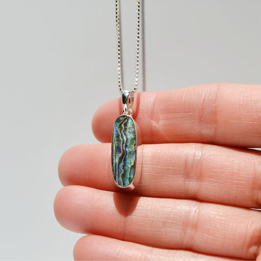 JeniMarie Jewelry with handmade abalone pendant along with a 18 inch box chain all in sterling silver.