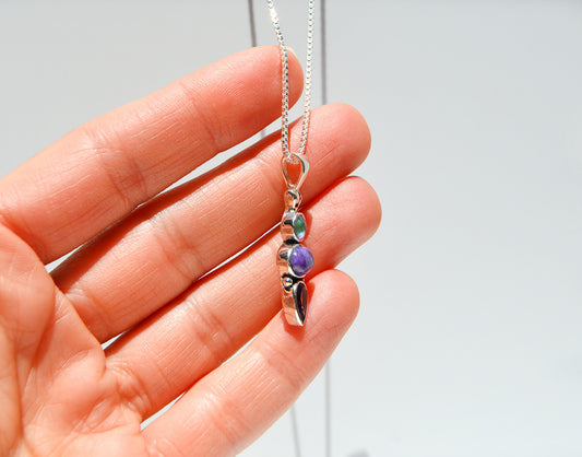 JeniMarie Jewelry with a pendant set in sterling silver with a box chain necklace to complete the look.
