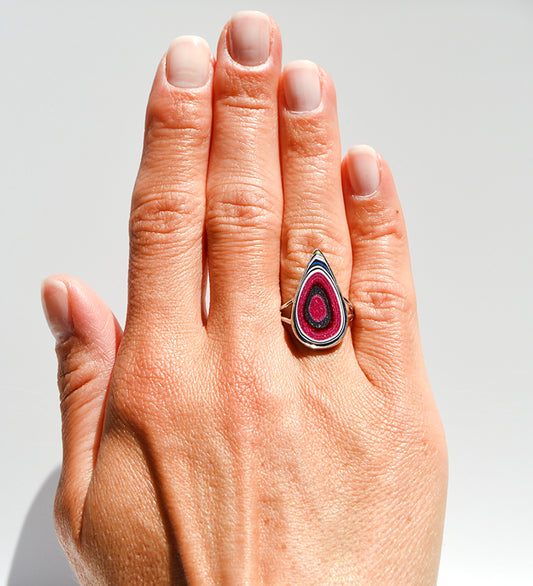 JeniMarie Jewelry with a sparkle fordite ring set in sterling silver with a comfort band.