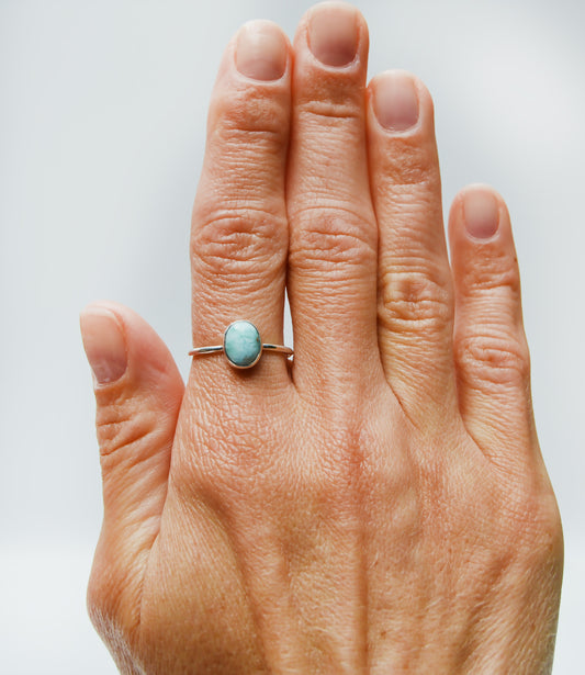 JeniMarie Jewelry with a fun larimar ring set in sterling silver hand polished for a high shine.