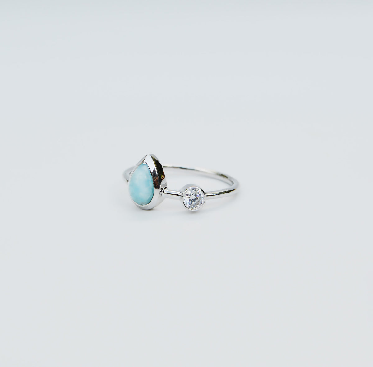 JeniMarie Jewelry with a beautiful sterling silver ring with a pear shaped larimar stone.