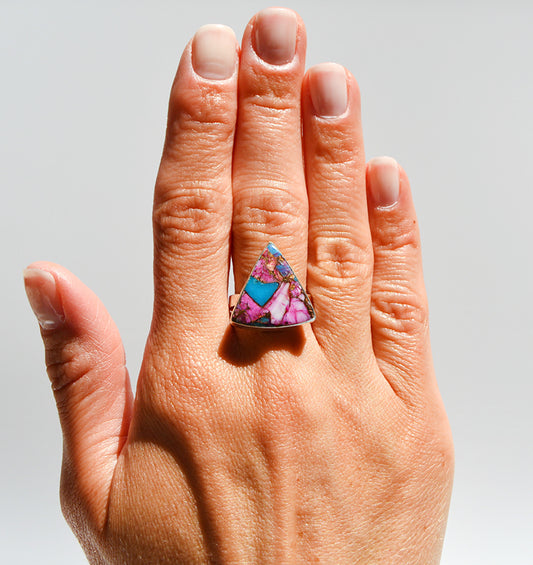 JeniMarie Jewelry with a custom and rare bright and light triangle ring set in sterling silver with a comfort band.