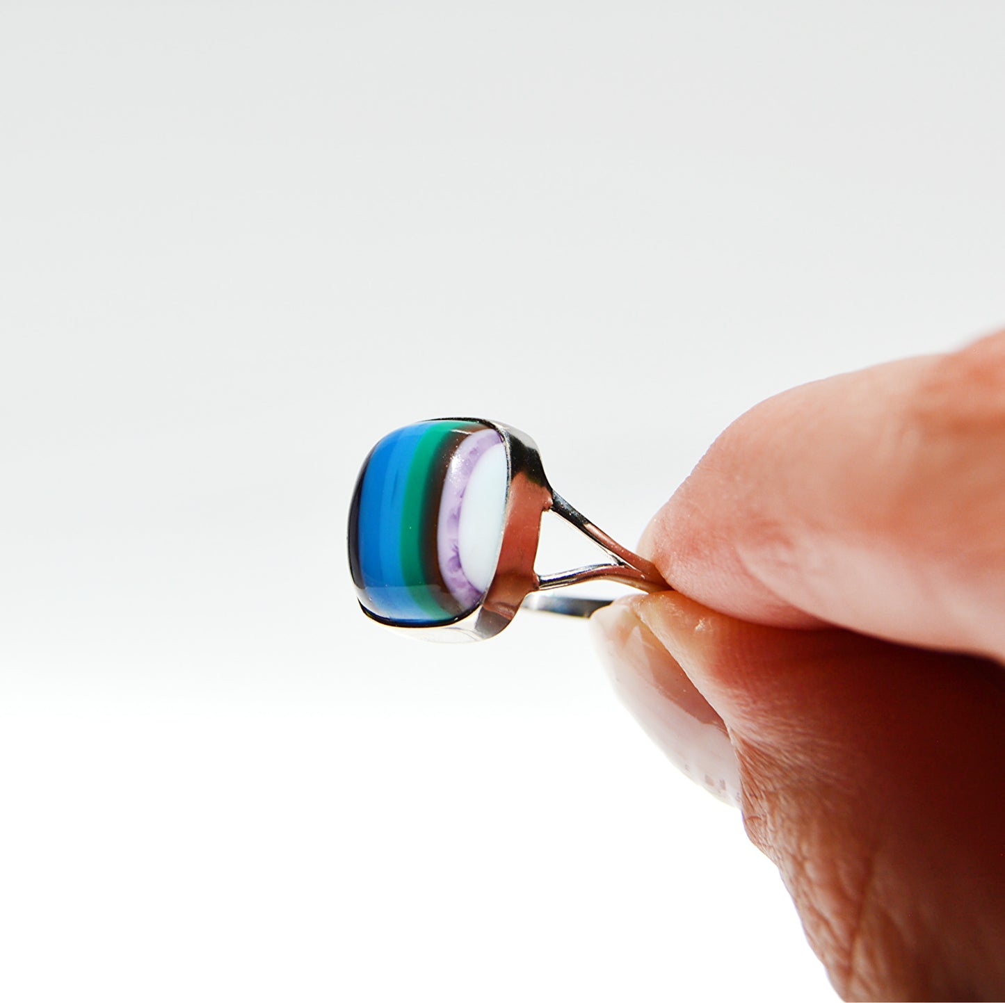 JeniMarie Jewelry with a rare and unique surfite ring with a comfort band set in sterling silver.
