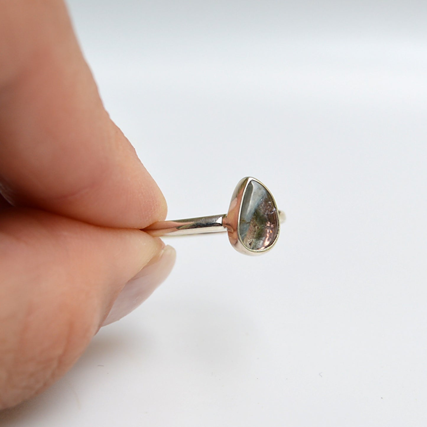 JeniMarie Jewelry with a pear shaped watermelon tourmaline ring set in .925 sterling silver. the comfort band and hypoallergenic metal make this a truly great ring.