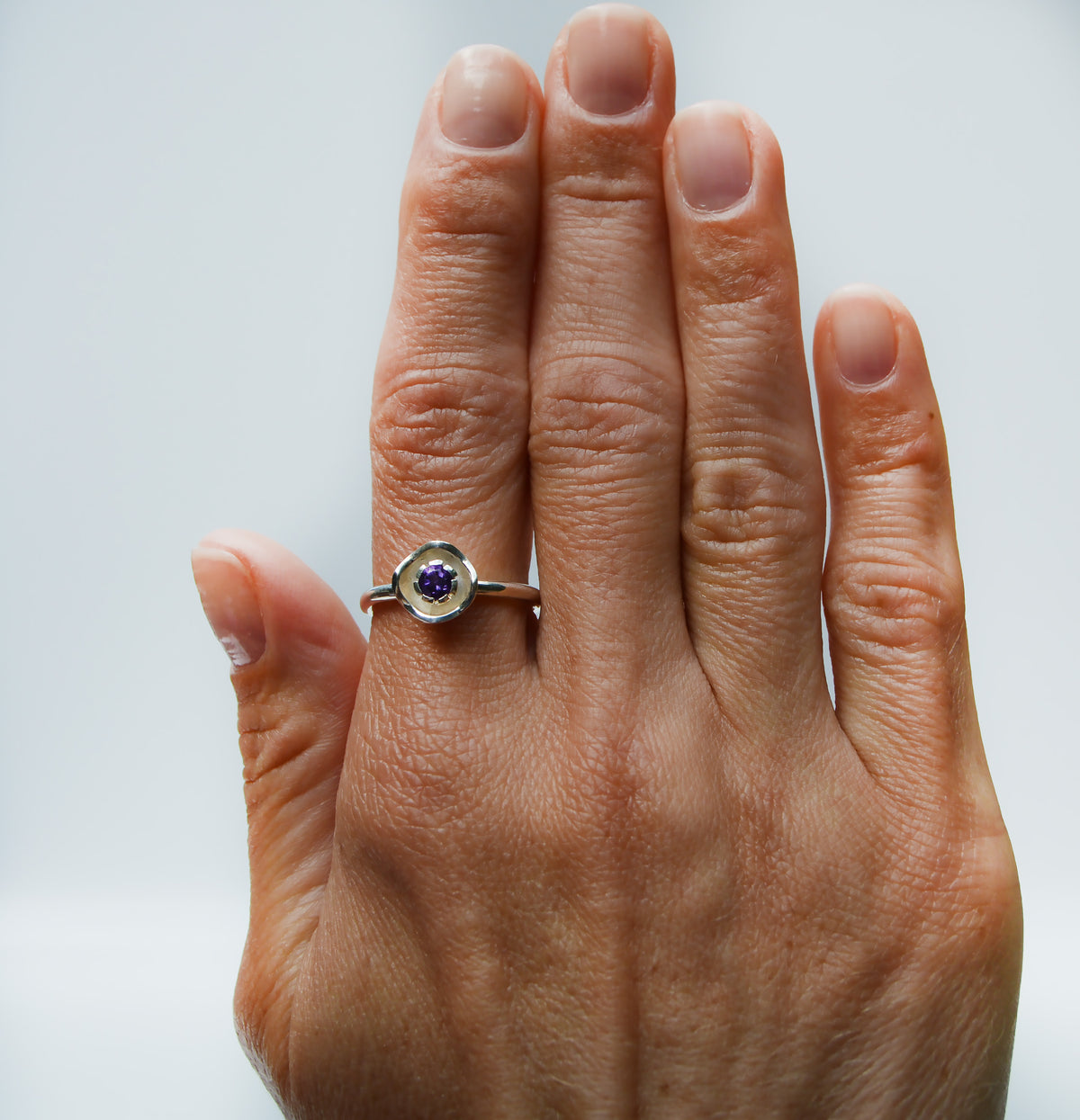 JeniMarie Jewelry with a fun and unique amethyst flower ring set in sterling silver. 