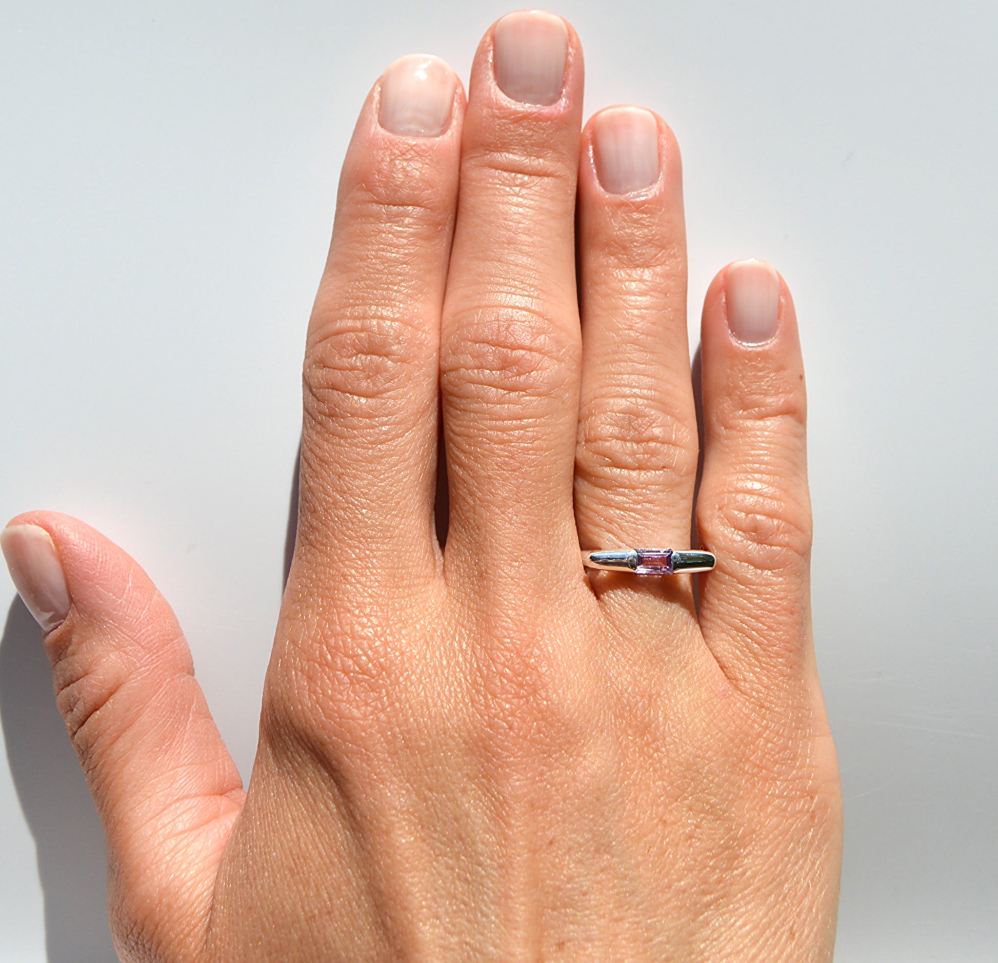 JeniMarie Jewelry with an amethyst ring set in .925 sterling silver making the ring hypoallergenic. 