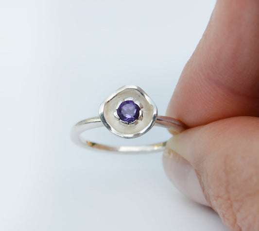 JeniMarie Jewelry with a fun amethyst ring looking like a flower, set in sterling silver. 