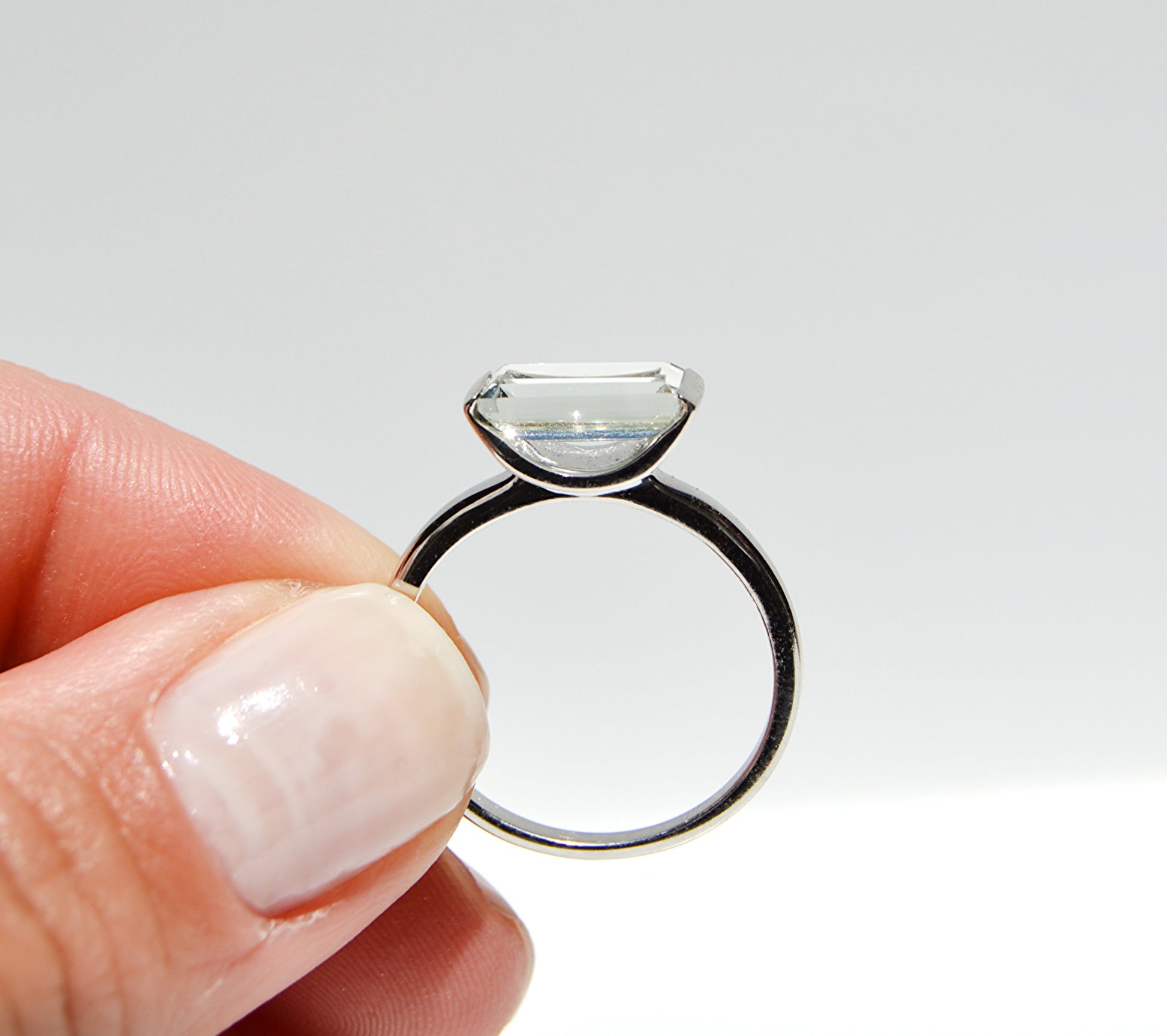 JeniMarie Jewelry with a custom and rare hard to find green amethyst that has been tension set and set in sterling silver. 