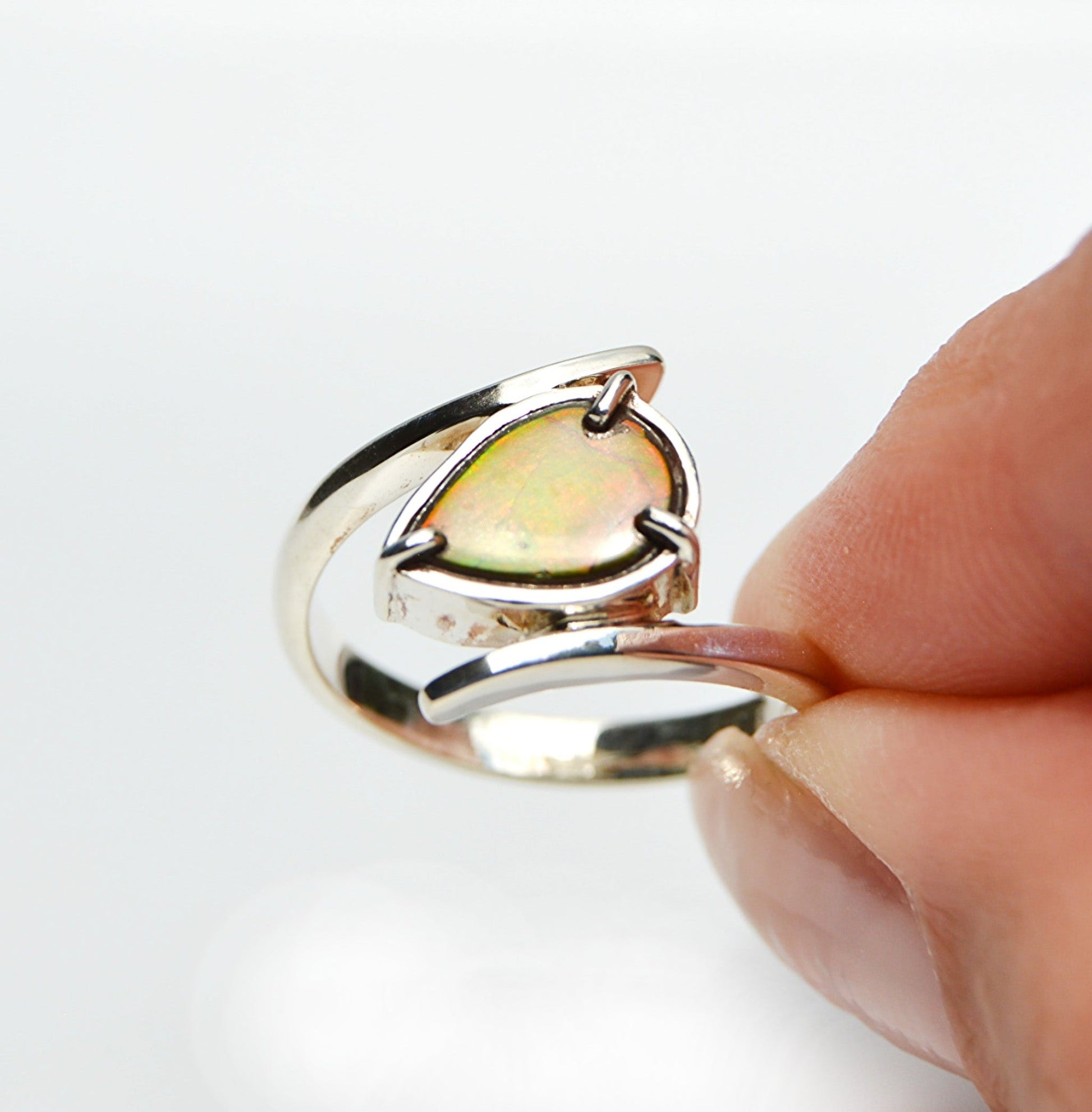 JeniMarie Jewelry with a handmade ammolite ring set in sterling silver. 