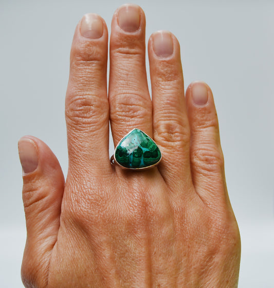 JeniMarie Jewelry with a statement ring featuring a forest green pear shaped one of a kind azurite and malachite stone. 