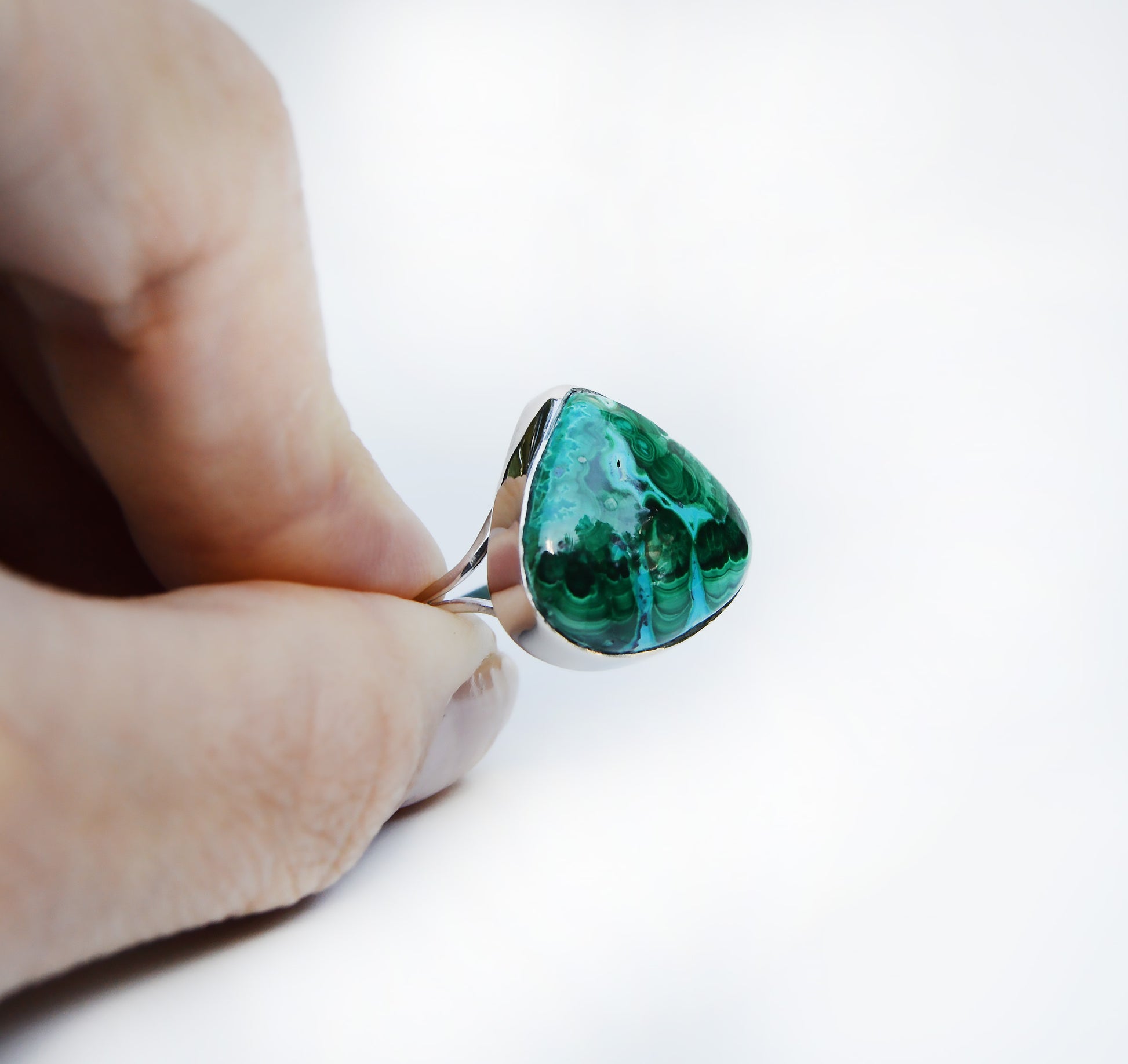 JeniMarie Jewelry with a custom ring set in sterling silver for a high polish. Ring features a rare combination of azurite and malachite. 