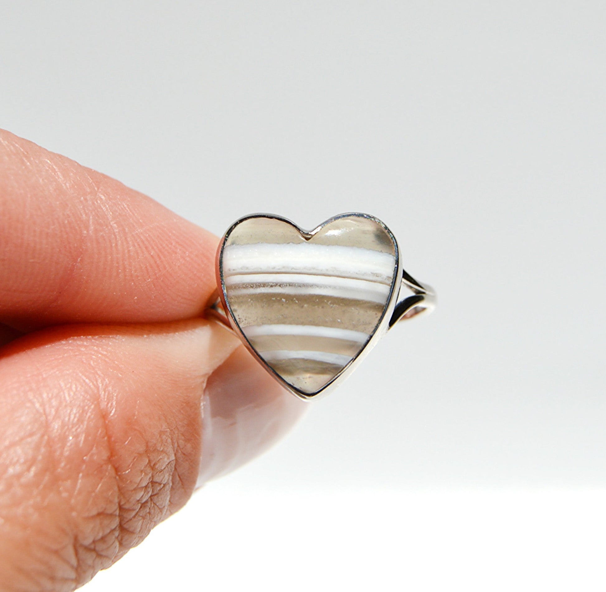 JeniMarie Jewelry with a rare and fun blue opal heart ring set in sterling silver. 