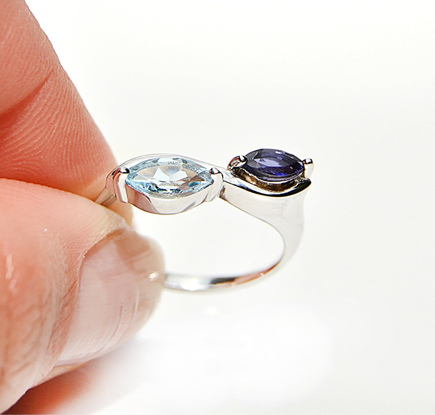 JeniMarie Jewelry with a rare double stone ring with blue topaz and tanzanite, set in sterling silver.