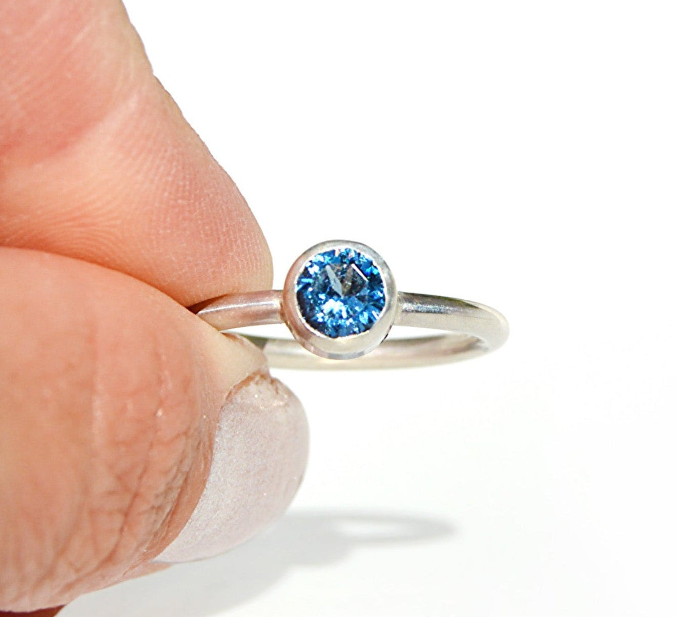 Silver ring with a blue zircon gemstone handmade sterling silver