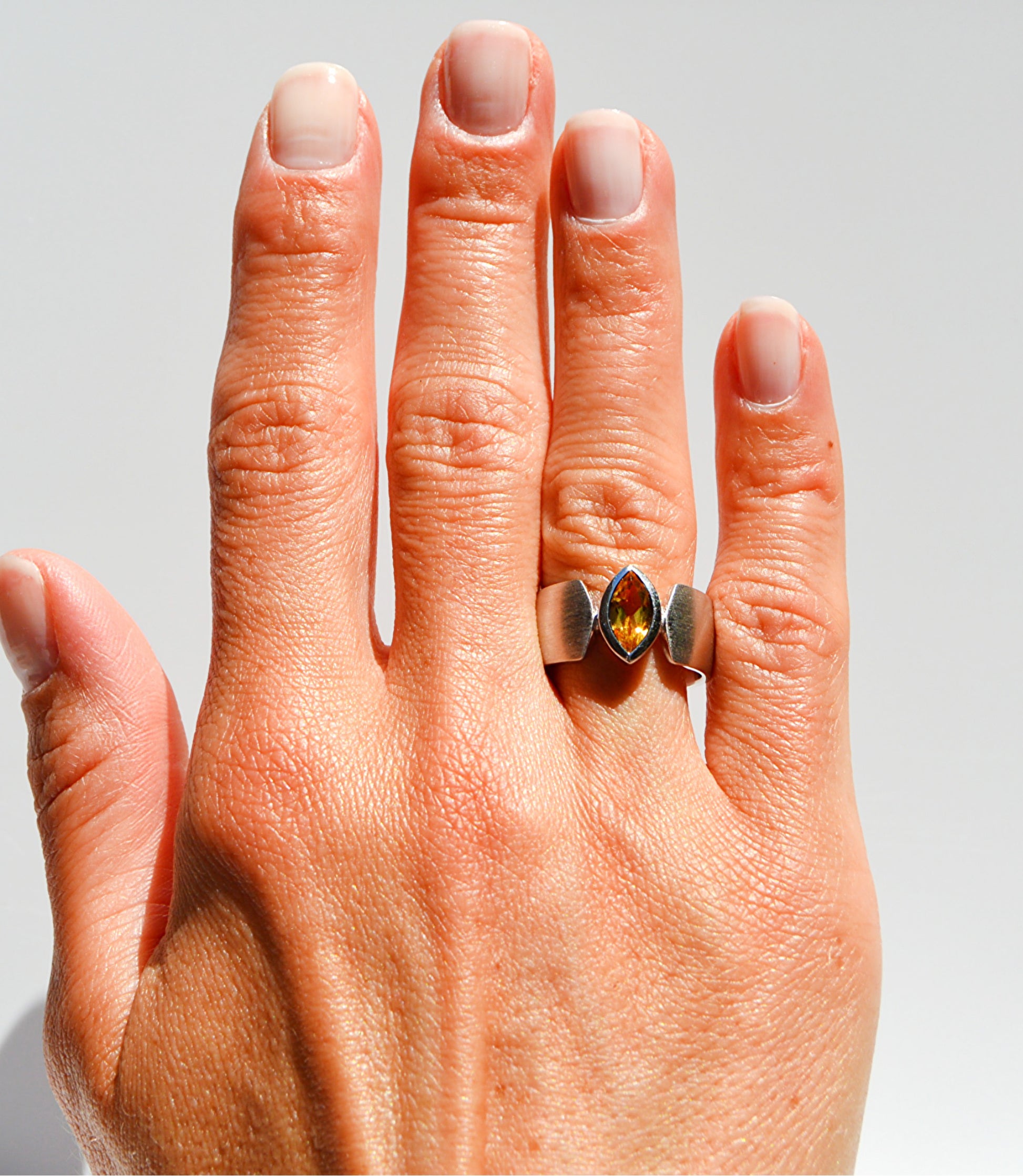 JeniMarie Jewelry with a rare brushed band citrine ring set in sterling silver with a comfort fit band. 