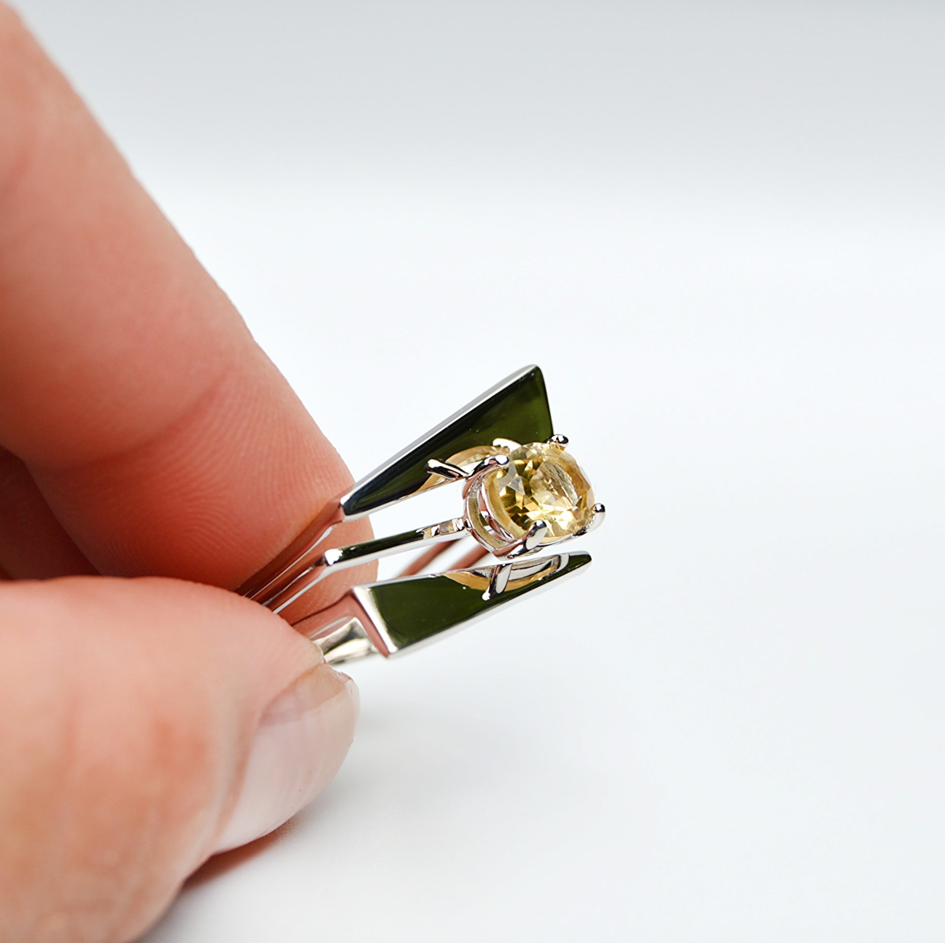 JeniMarie Jewelry with a beautiful yellow citrine stone prong set on a sterling silver band with a high polish for extra shine. 