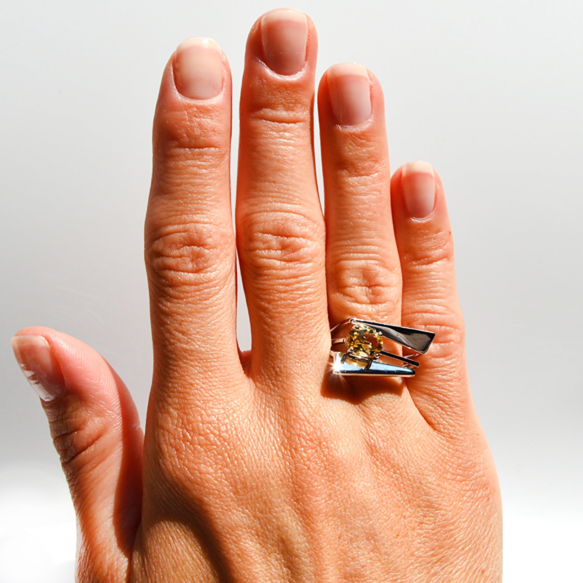 JeniMarie Jewelry with a rare and unique yellow citrine ring with a square multi band design set in sterling silver. 