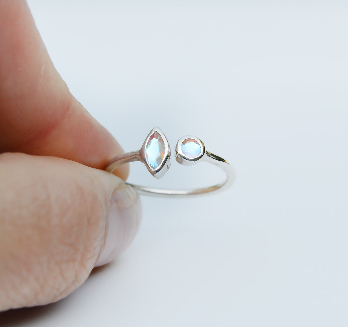 JeniMarie Jewelry with a stunning open band design ring using a Czech quartz set in sterling silver. 