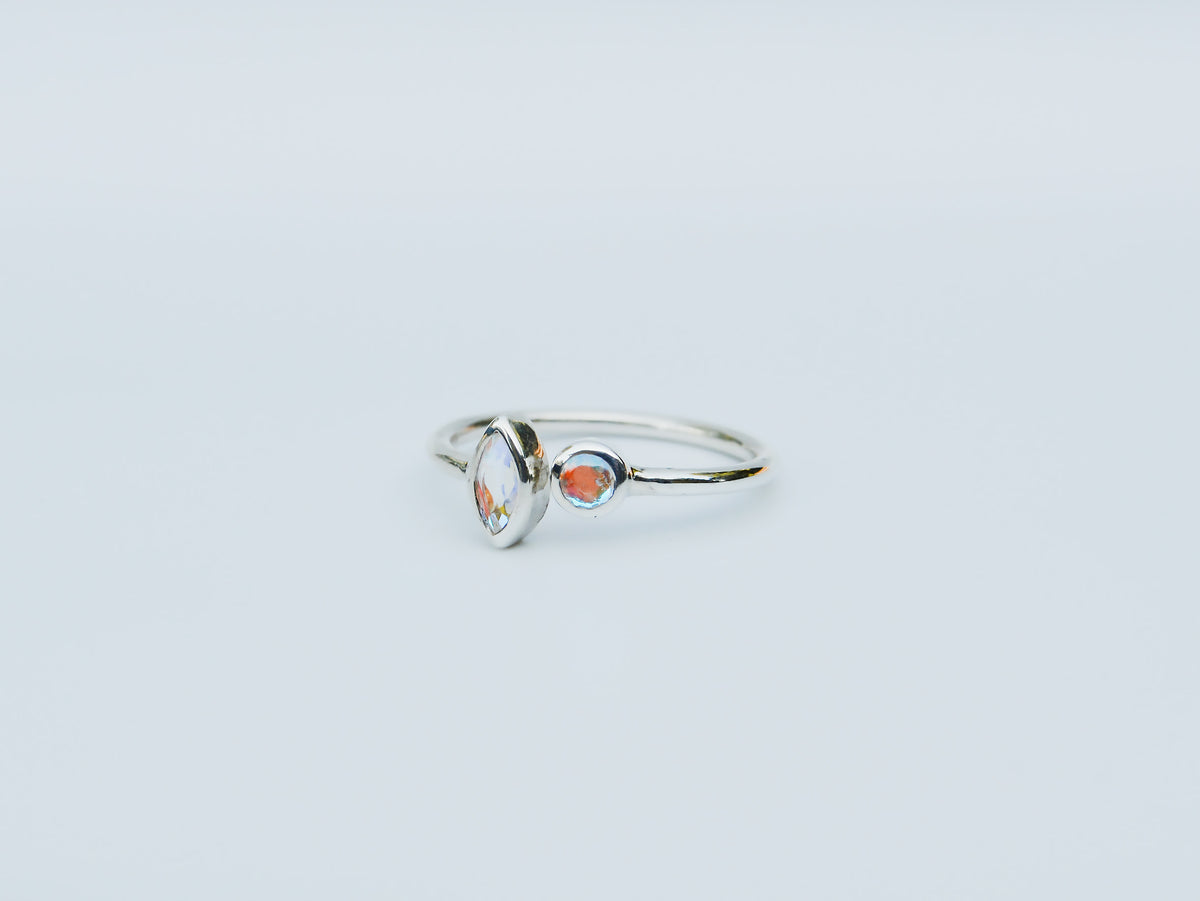 JeniMarie Jewelry with a stunning two stone different shapes, open band sterling silver ring. 