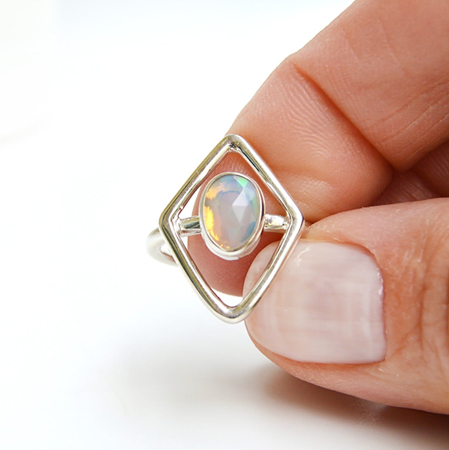 JeniMarie Jewelry Ethiopian Opal set in sterling silver with a polished comfort band. 