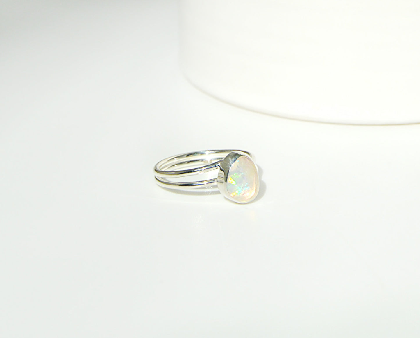 Ethiopian opal double band hand set ring with oval ethiopian opal 