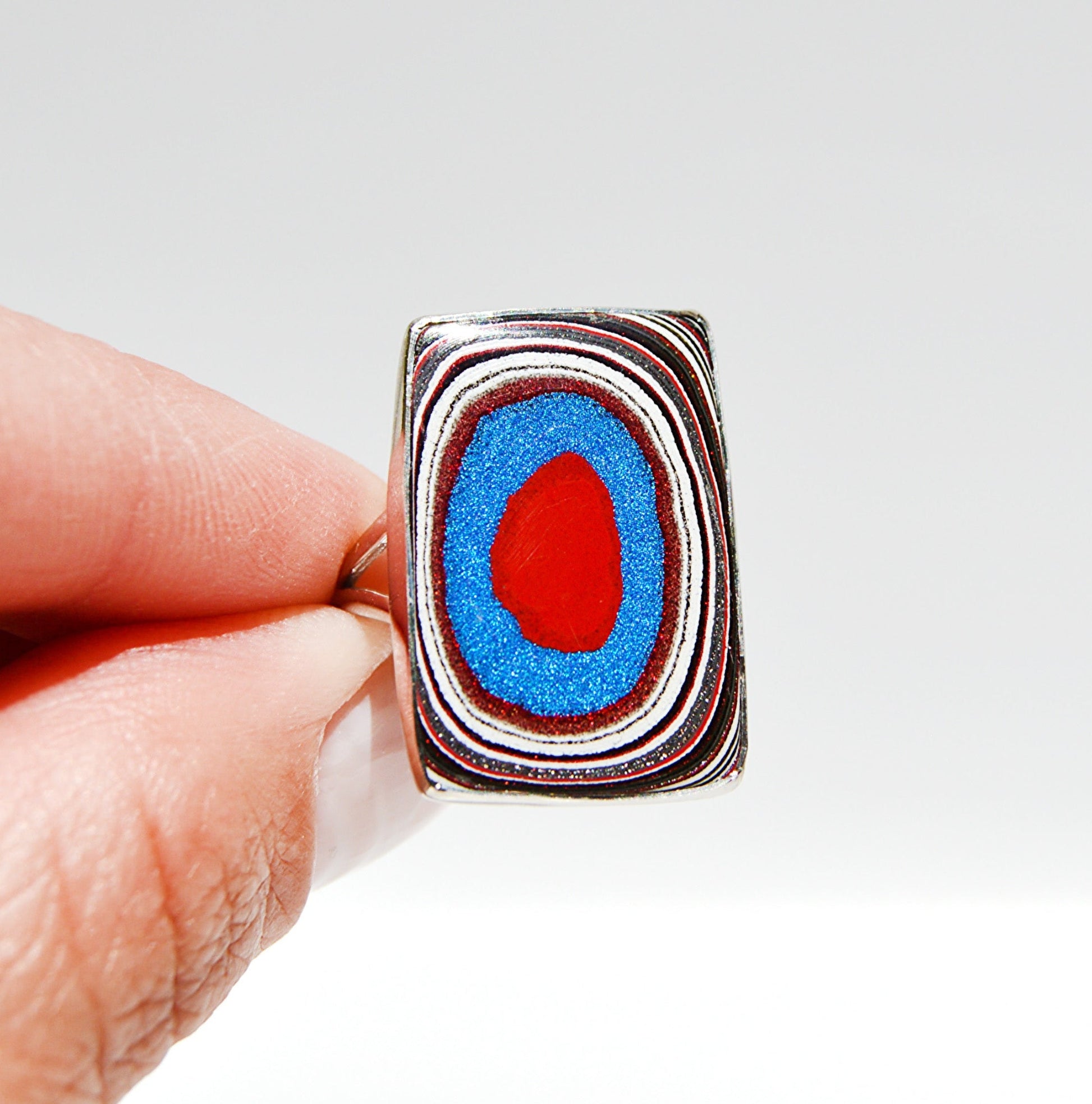 JeniMarie Jewelry with a rectangle fordite ring. very rare and set in sterling silver. 