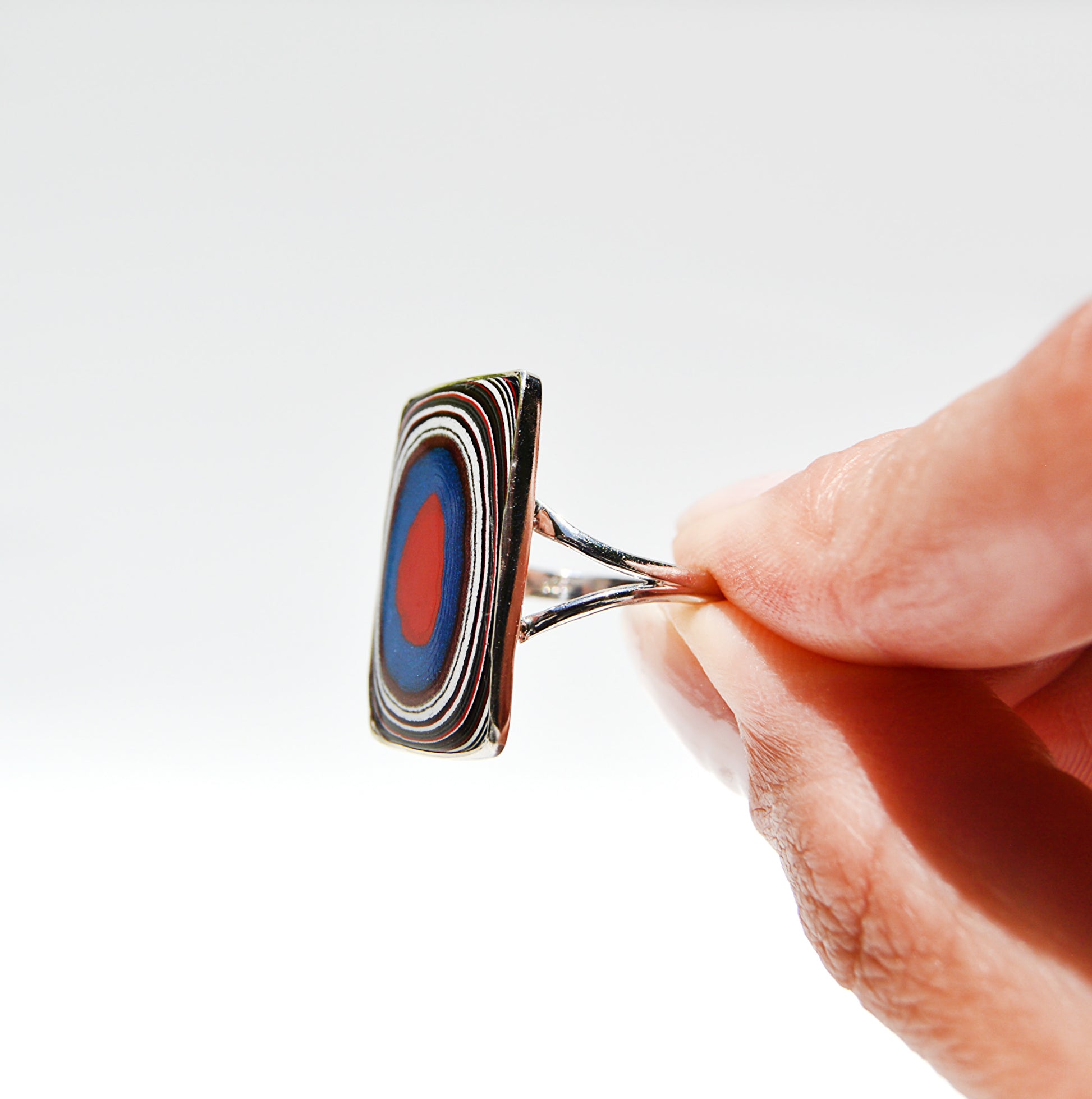 JeniMarie Jewelry with a unique and rare fordite ring set in sterling silver. 