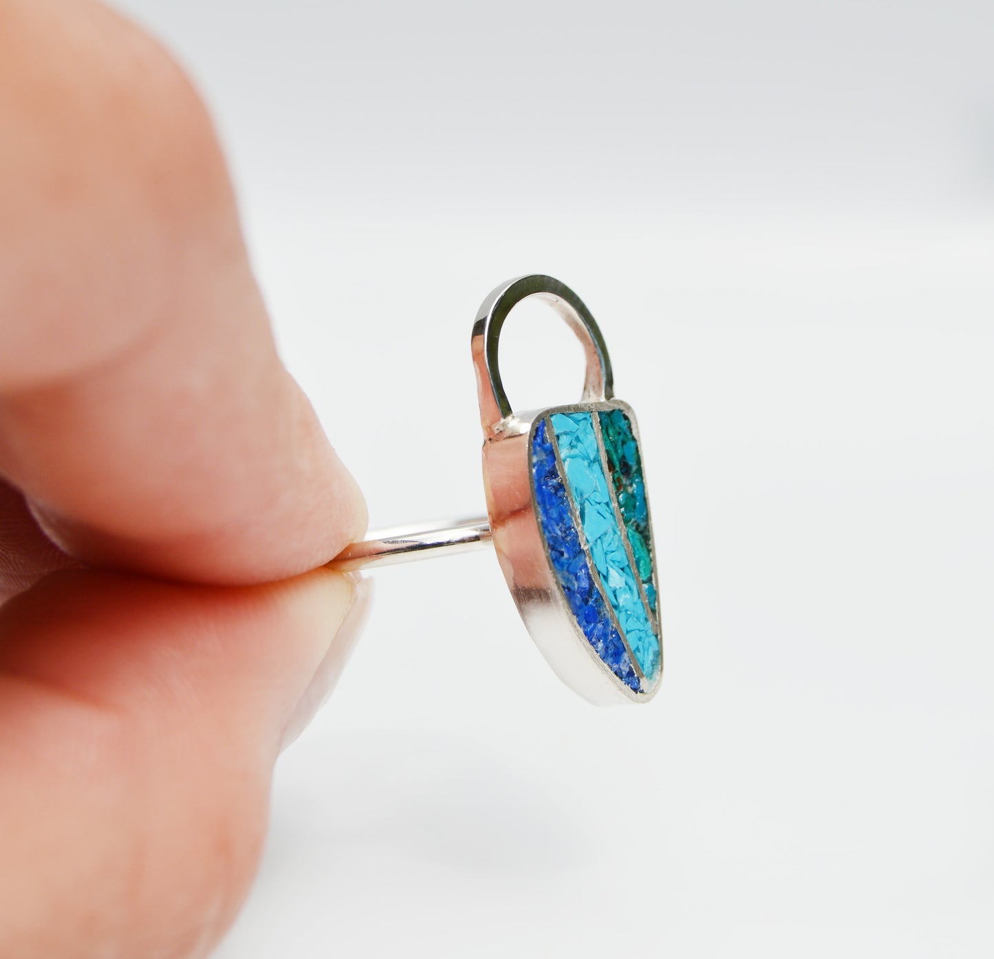 JeniMarie Jewelry with a statement ring with a unique inlay design featuring three different stones to create one piece. 
