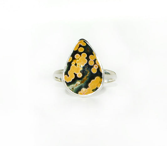 Teardrop-shaped ring with yellow and black Jasper stone