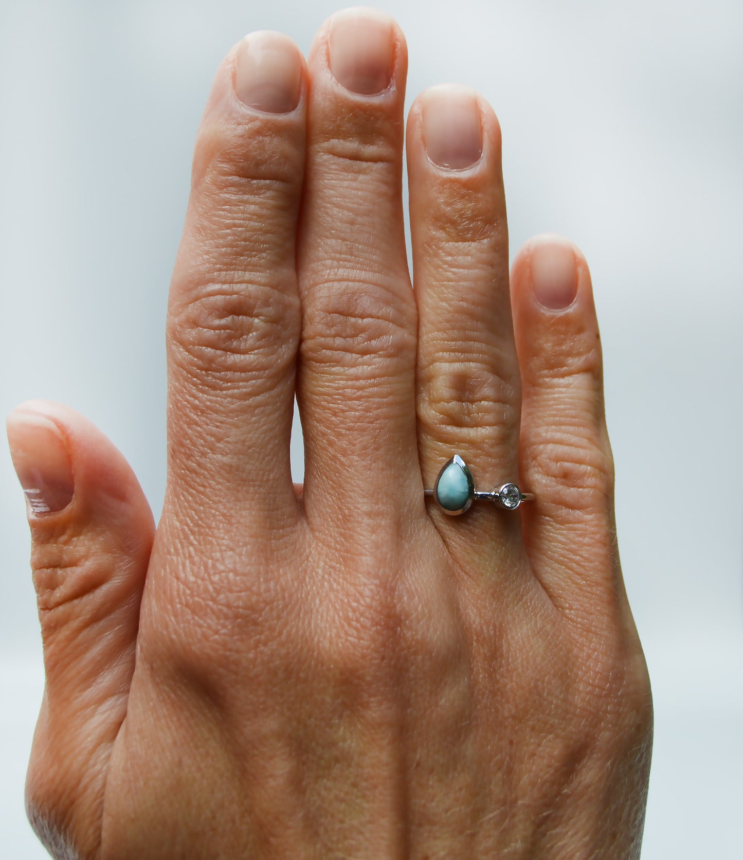 JeniMarie Jewelry with a fun ring that features a stunning larimar stone accented by a Czech crystal. 