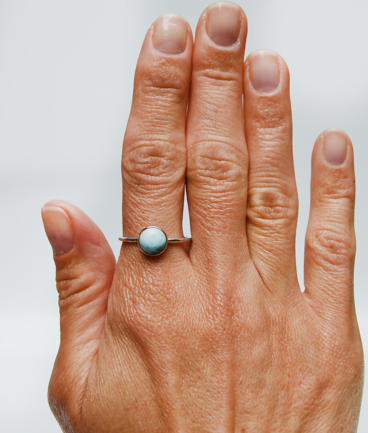 JeniMarie Jewelry with a fun and cool looking larimar ring set in polished 925 sterling silver. 