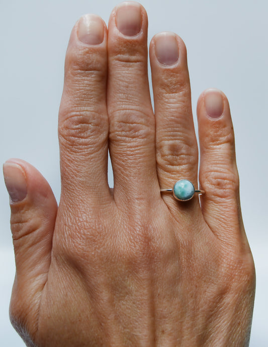 JeniMarie Jewelry with a stunning sterling silver ring featuring a larimar stone hand polished for a high shine. 