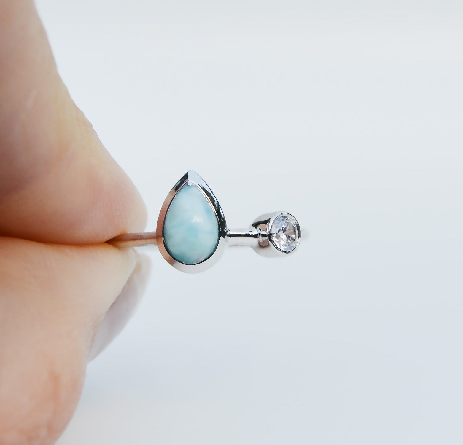 Jenimarie Jewelry with a stunning two stone ring featuring a pear shaped larimar ring all set in sterling silver. 