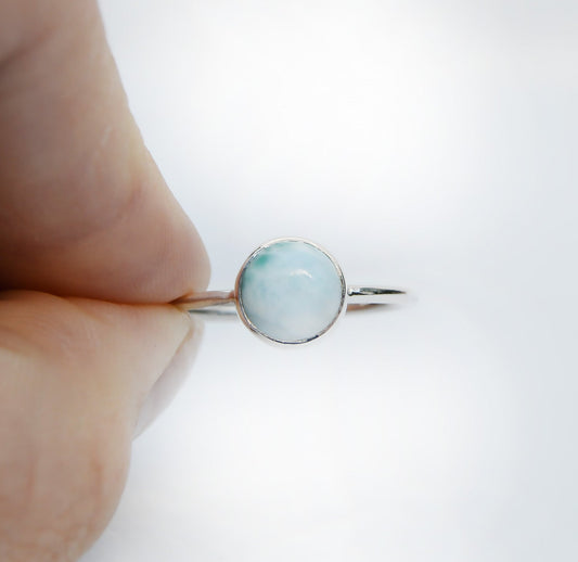 JeniMarie Jewelry with a soft blue round Larimar stone ring set in sterling silver. 