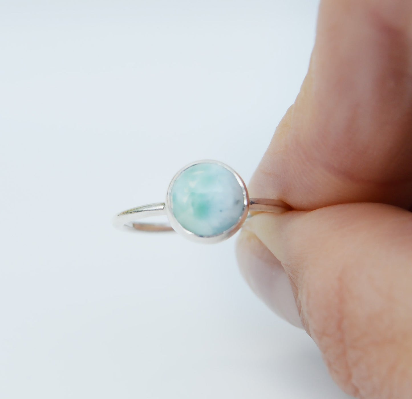 JeniMarie Jewelry with a fun ring set in sterling silver showcasing a larimar stone. 