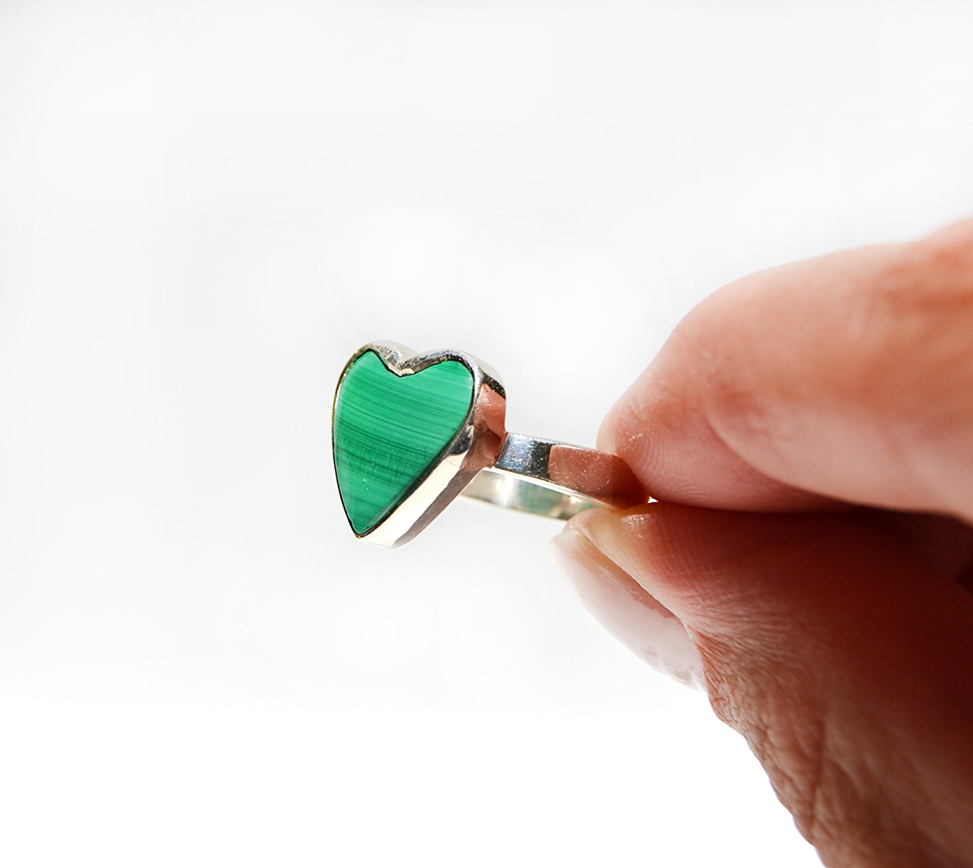 Sterling silver ring with a green Malachite heart ring. From JeniMarie Jewelry 