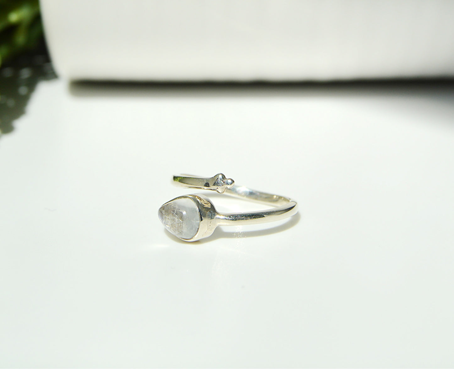 handset stone in a handcrafted adjustable ring all set in .925 sterling silver. 