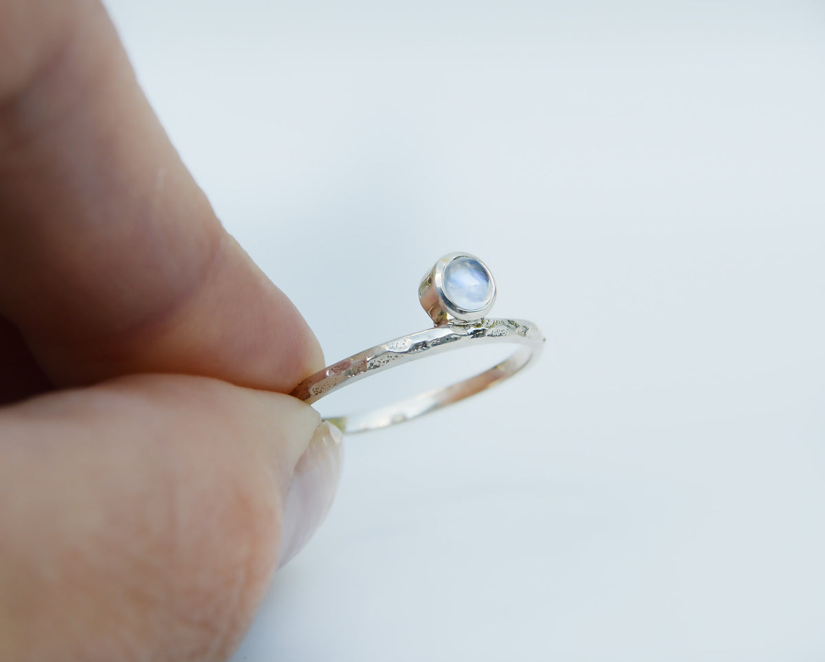 JeniMarie Jewelry with a beautiful moonstone ring set in sterling silver and featuring a textured band for added appeal. 