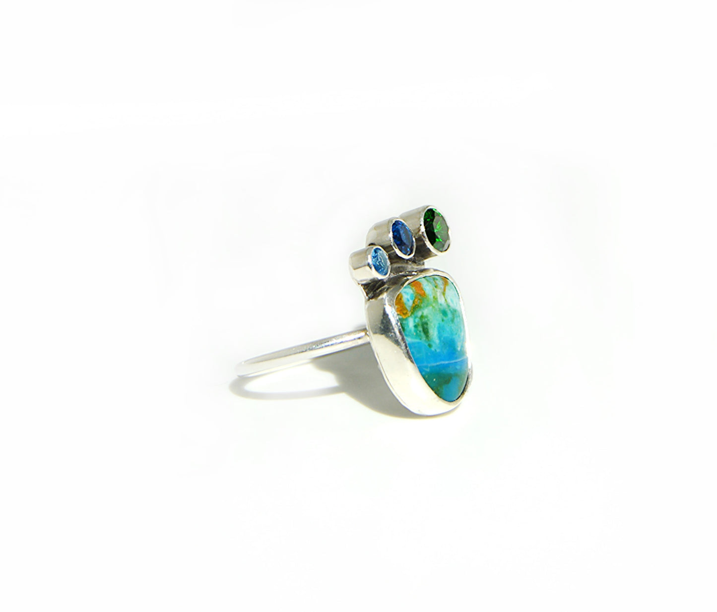 Unique and cool Peruvian Opal handset in a fine silver bezel with a sterling silver band. 