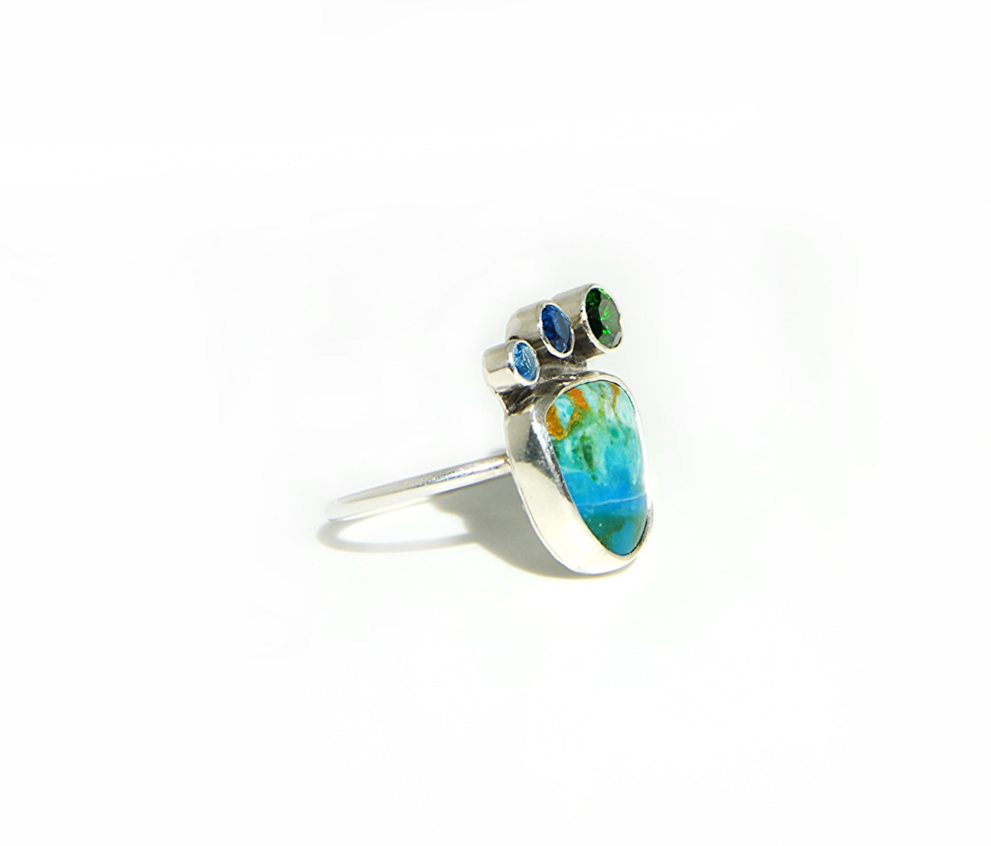 Unique and cool Peruvian Opal handset in a fine silver bezel with a sterling silver band. 