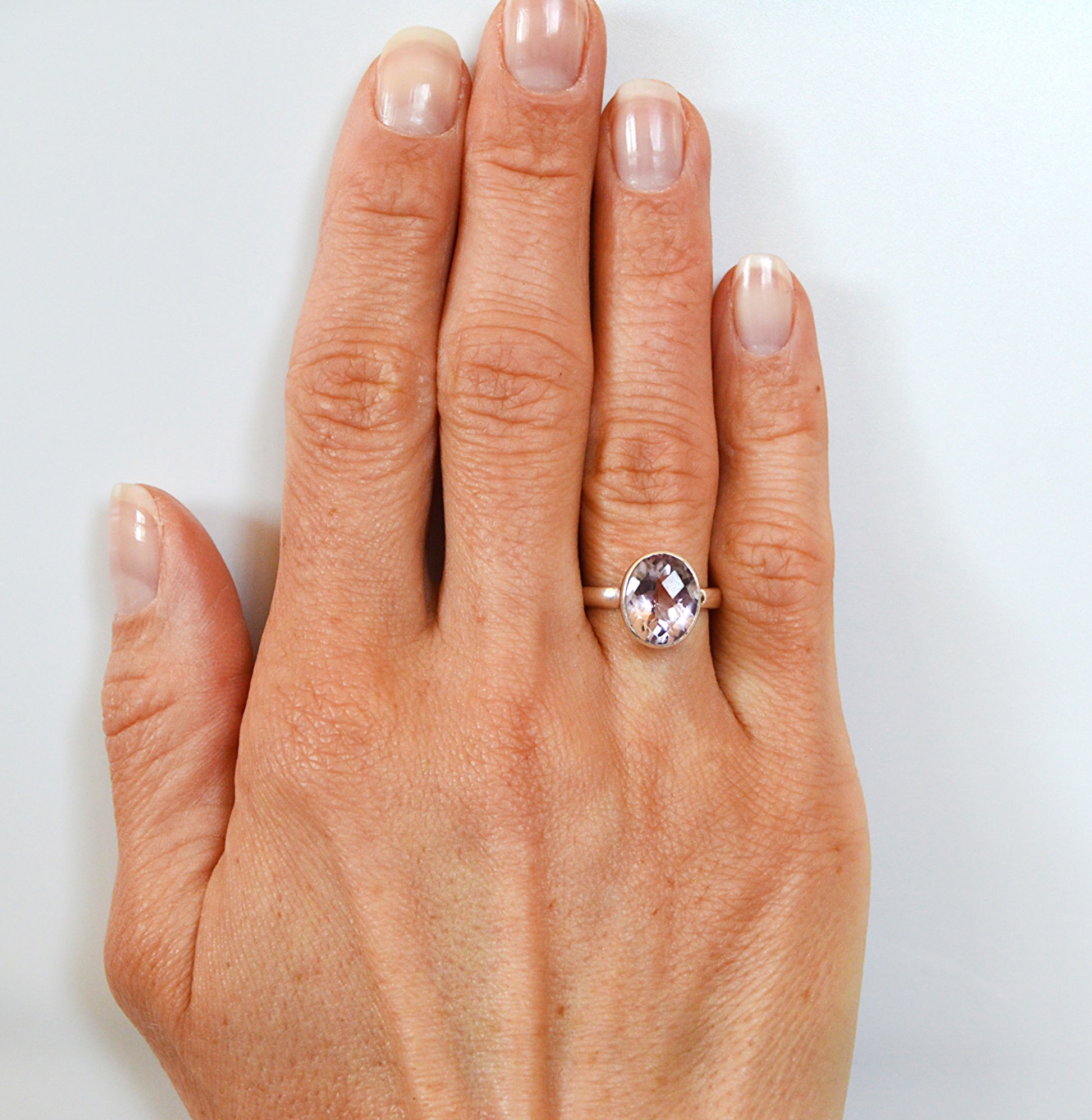 .925 sterling silver with a handset large oval rare pink amethyst 