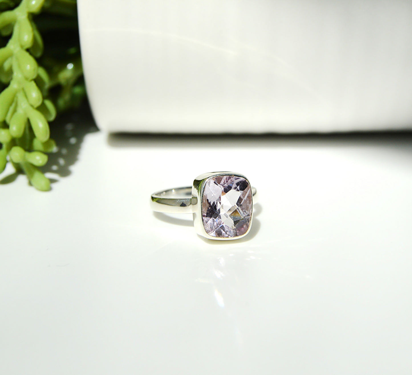 One of a kind handmade sterling silver ring using a large rectangle rare pink amethyst stone 