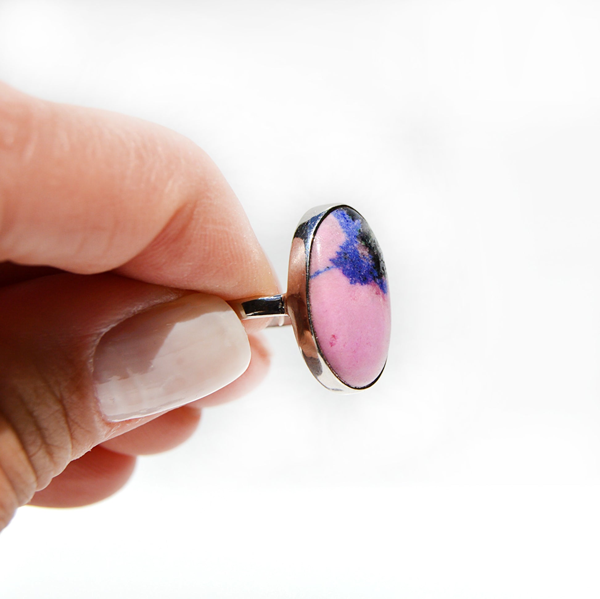 JeniMarie Jewelry with a pink and purple druy ring with a comfort band set in Sterling Silver. 