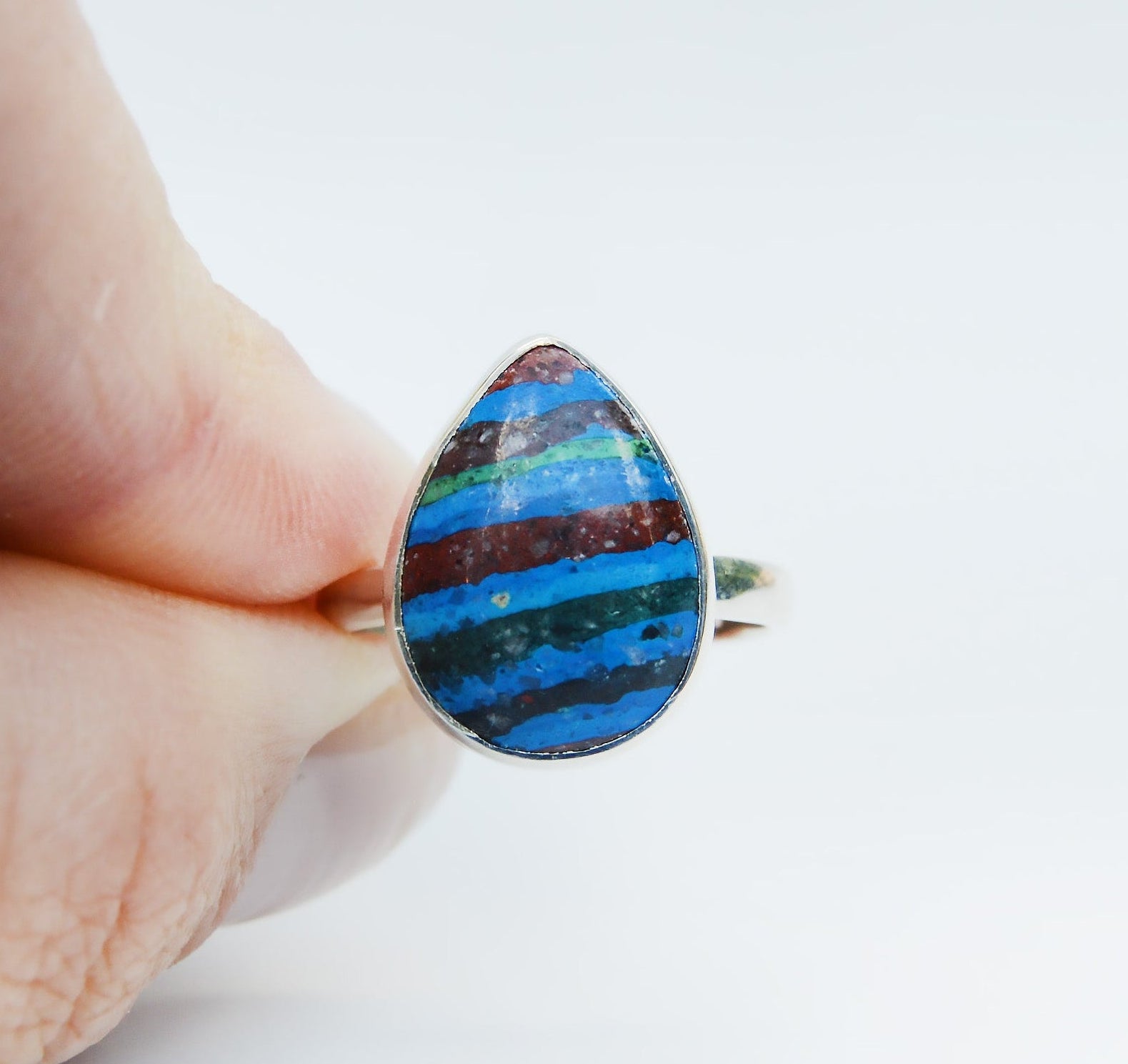 JeniMarie Jewelry with a rainbow calcite ring set in sterling silver for a fun and unique look 