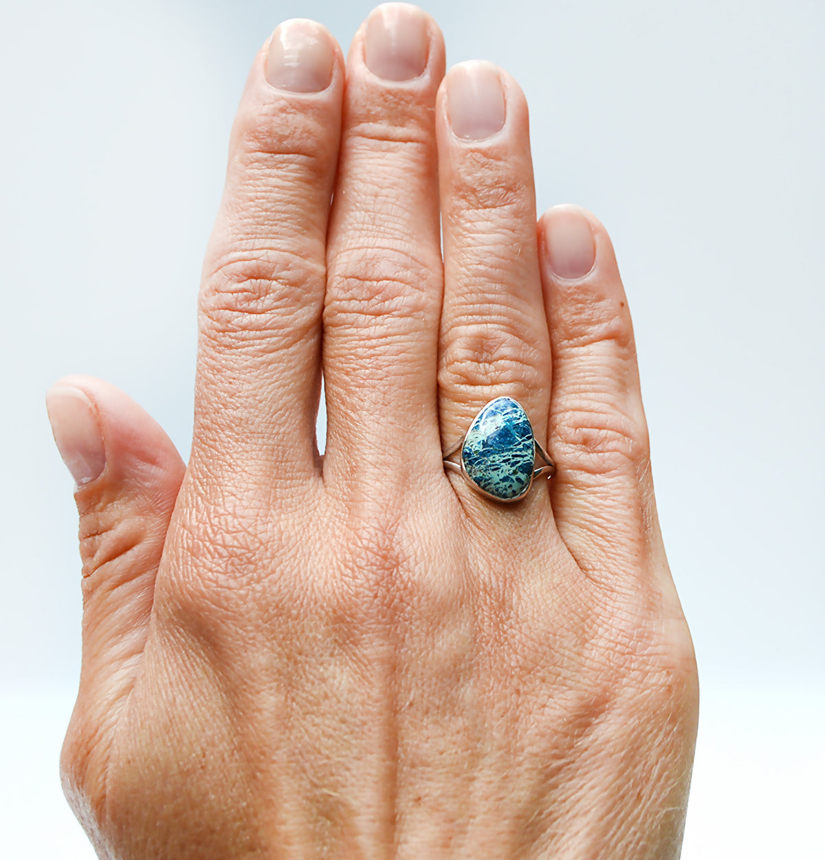 JeniMarie Jewelry with a statement ring featuring a shattuckite stone set in sterling silver with a hand polish for extra shine. 