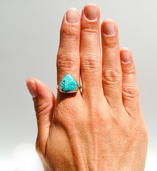 JeniMarie Jewelry with a statement ring with an ocean blue stone set in sterling silver. 