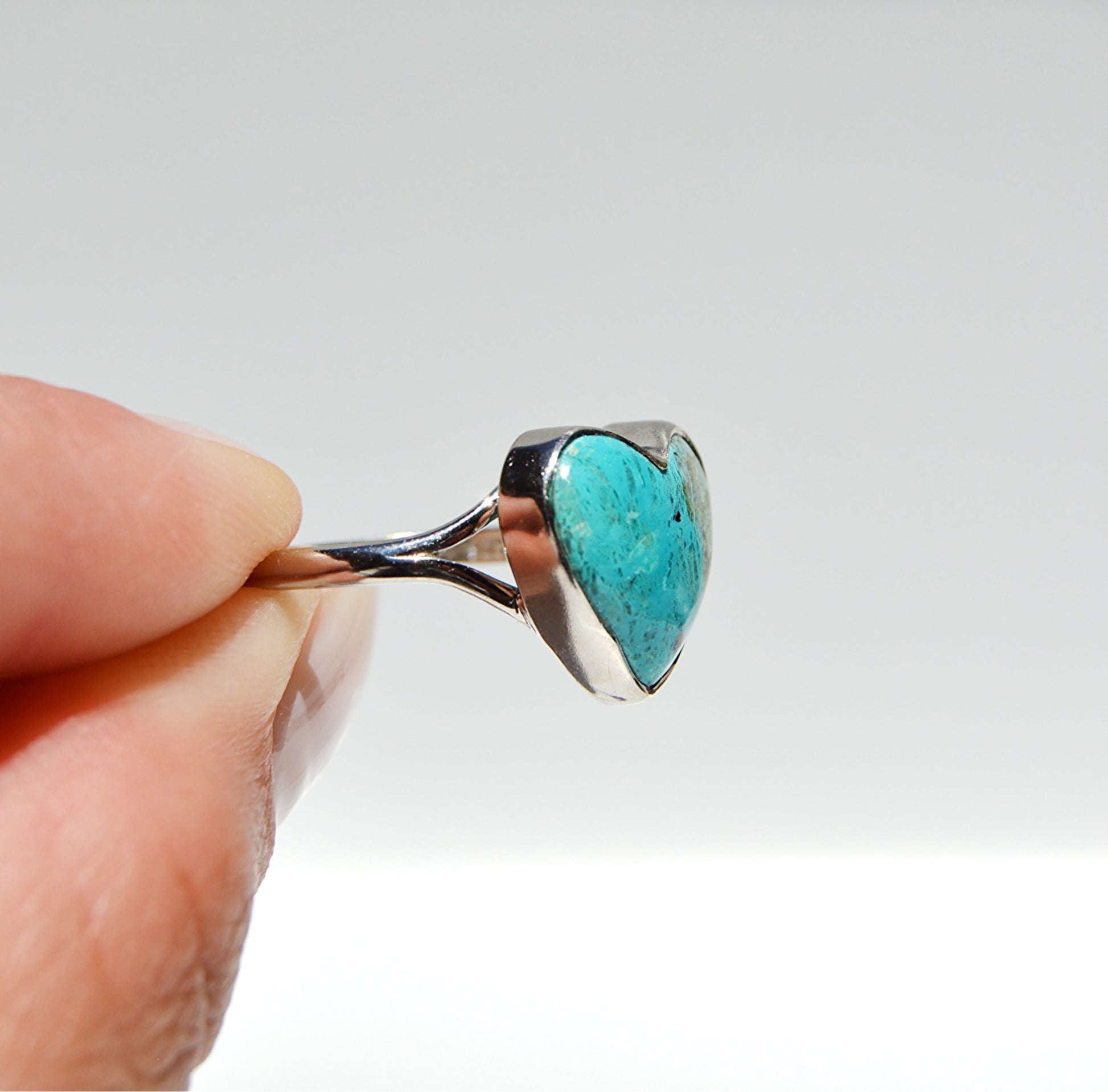 JeniMarie Jewelry with a rare and beautiful heart ring with shades of blue and green. 