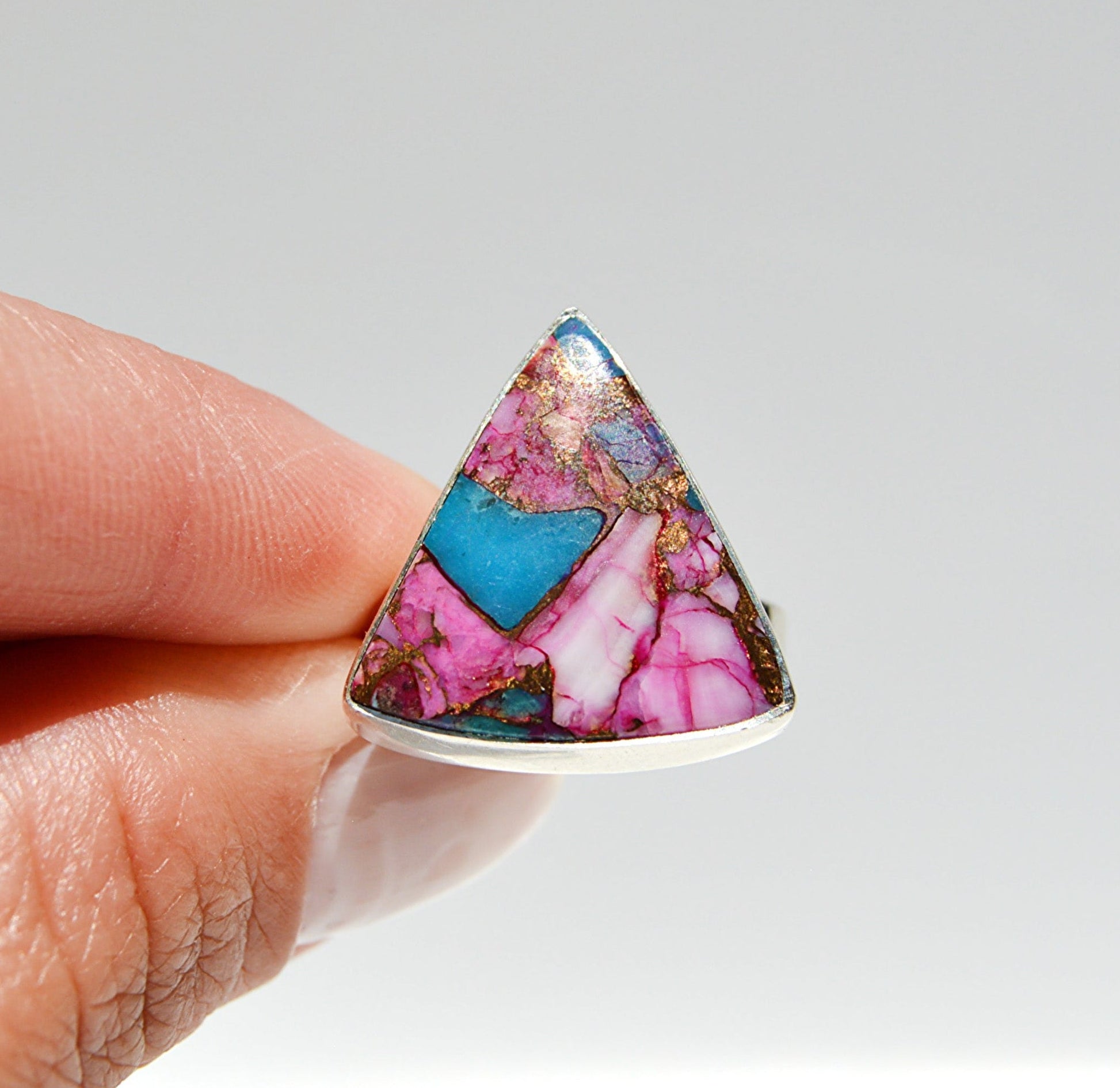 JeniMarie Jewelry with a rare and unique triangle spiney oyster turquoise ring set in sterling silver. 