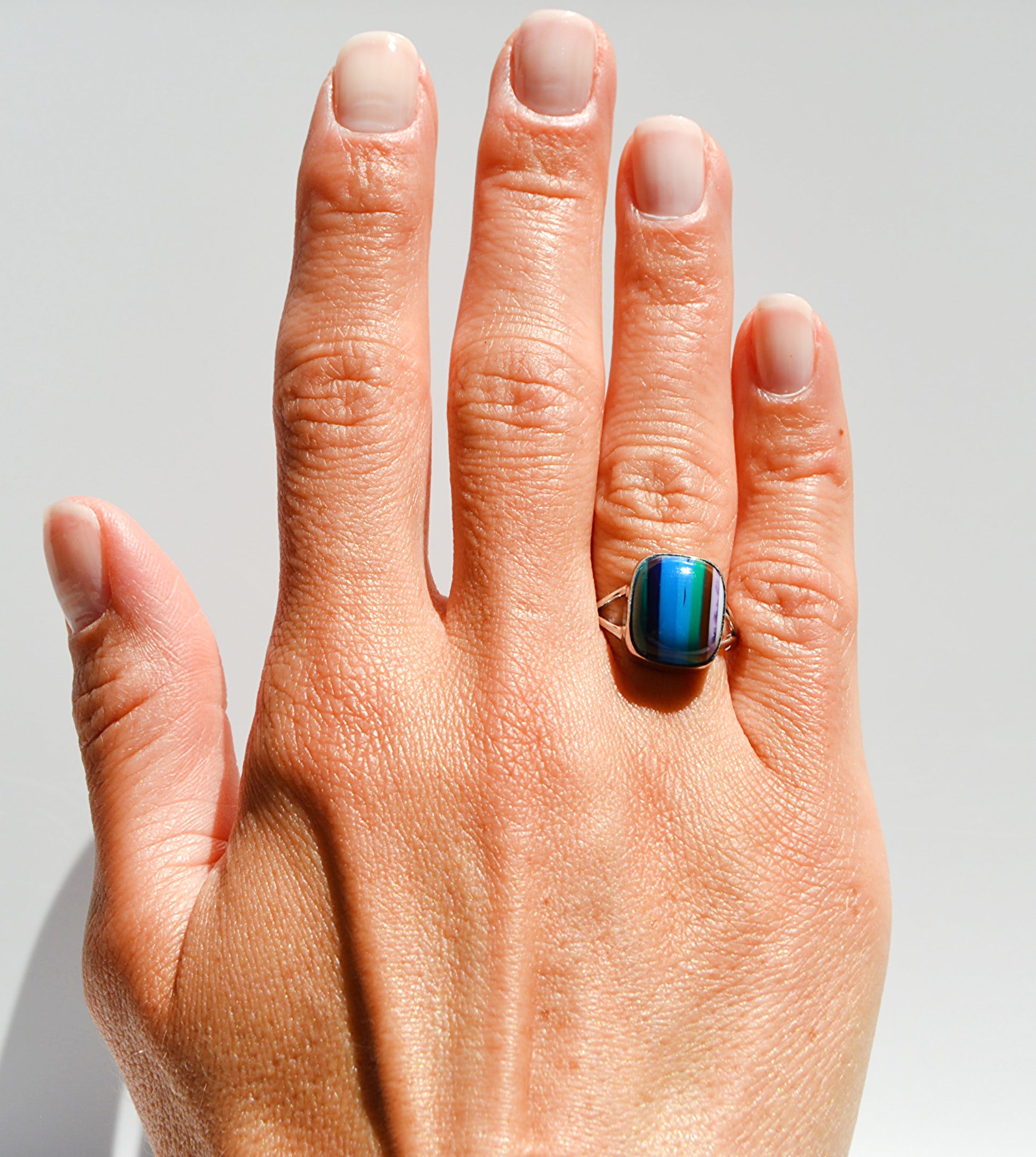JeniMarie Jewelry with a rectangle bright and unique surfite ring set in sterling silver. 