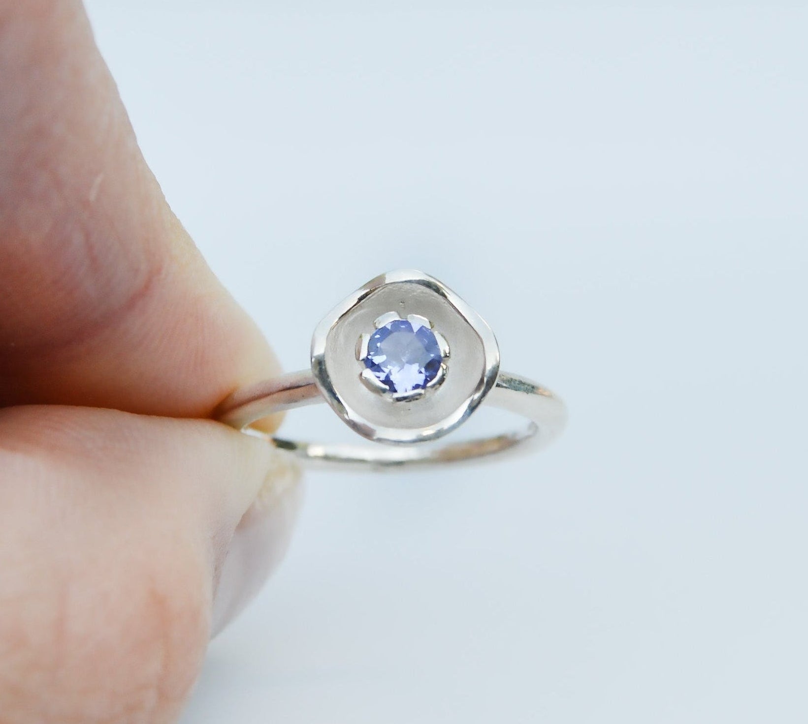Handmade Tanzanite flower ring from JeniMarie. Made from purple tanzanite and .925 sterling silver. 
